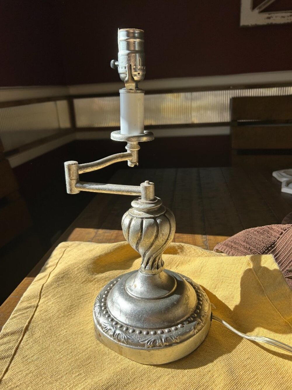 Vintage Sliver plated table  lamp  with a swivel gimbal arm often used on desks